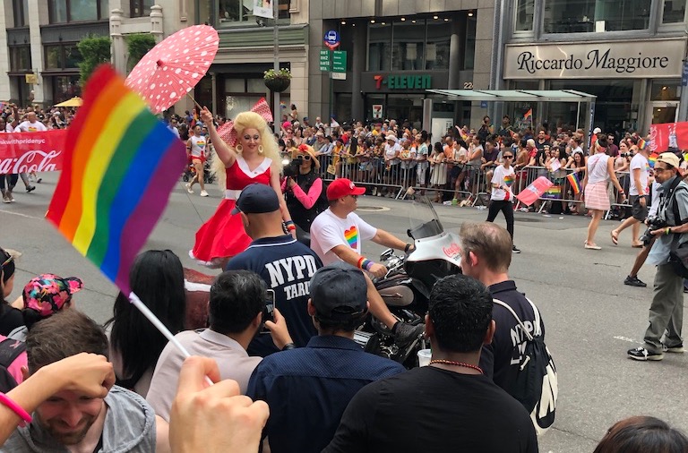 Drag queen in red at NYC Pride March 2018