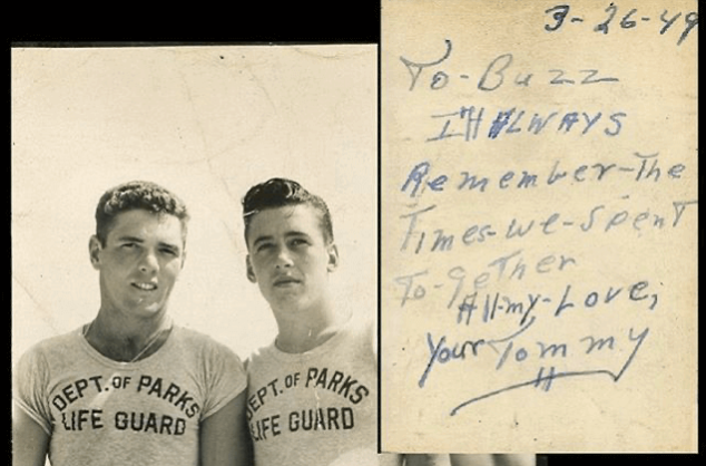 2 male lifeguards with 1949 message on back of photo