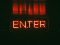 ENTER red neon sign