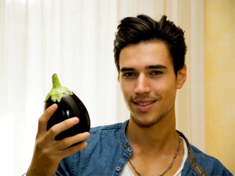 Man holding eggplant